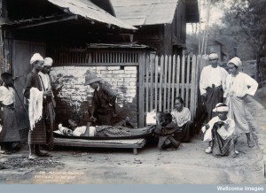 V0029676 An outdoor examination of a plague patient in Mandalay. Phot